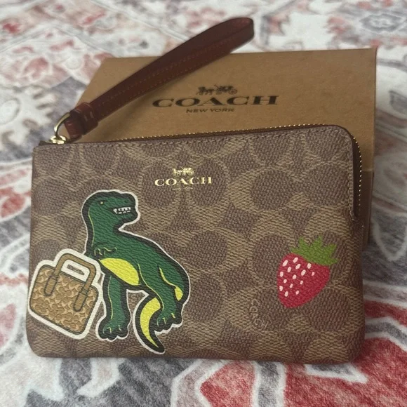 New! Coach Signature Dinosaur Corner Zip Wristlet (model CW856) Brown Wristlet - Picture 1 of 9